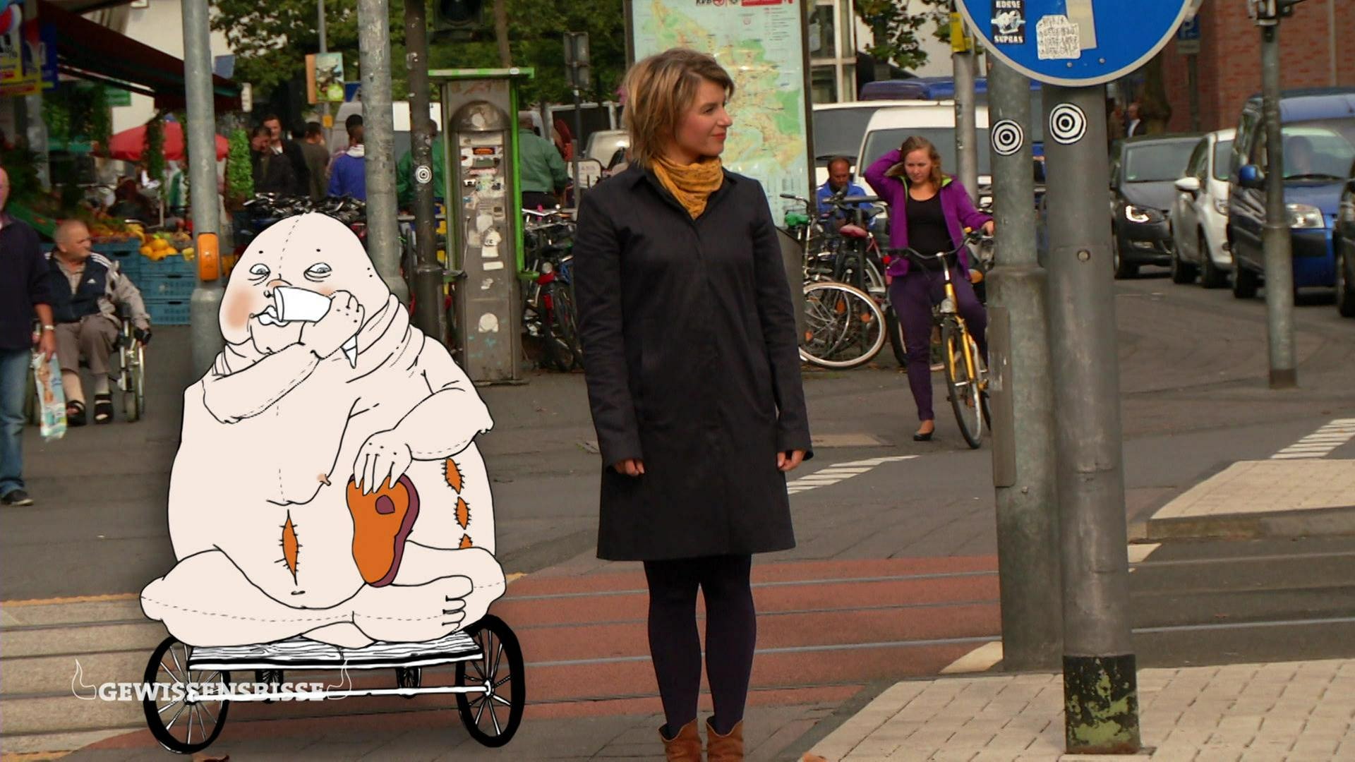 Die Moderatorin steht an einer Straße, neben ihr die Zeichnung der personifizierten Völlerei: eine nackte, fette Person, die isst und auf einem Wagen sitzt. Am Bauch platzen Nähte.
