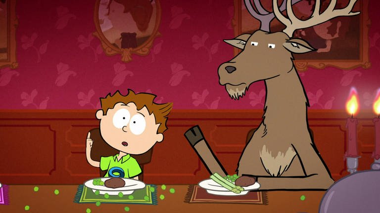 Der kleine Philosoph Knietzsche sitzt mit einem Hirsch an einem gedeckten Tisch und hebt die Hand.