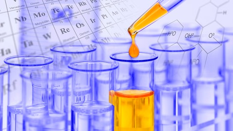 Ein Experiment im Chemielabor mit einer gelben Flüssigkeit in Reagenzgläsern