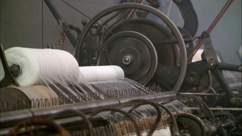 Detail alte Spinnmaschine in Betrieb
