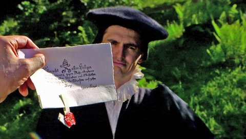 Hand mit Ablassbrief