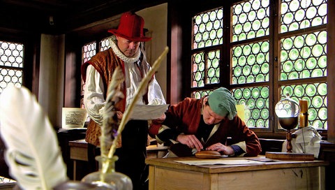 Männer beim Kupferstechen (Spielszene)