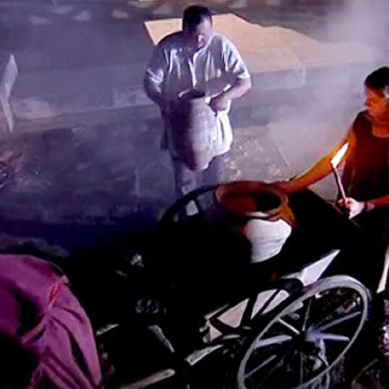 Färber mit Amphore auf dem Weg zu seinem Karren