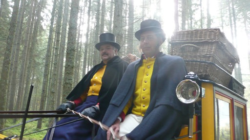 Zwei Postkutscher auf der Postkutsche