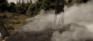 Animation eines Köhlers bei der Arbeit.