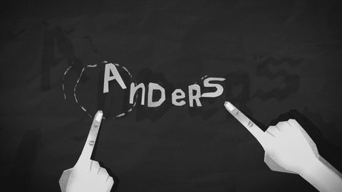 Schriftzug „anders“ mit zwei Fingern, die auf Buchstaben deuten