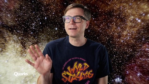 Ralph Caspers mit dem Weltall im Hintergrund. Was ist dunkle Materie? Welche Rolle spielt sie im Aufbau des Universums?