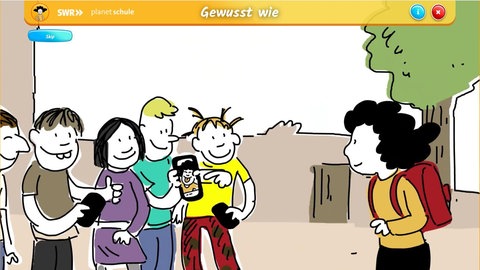 Elli und eine Gruppe Kinder auf dem Schulhof.