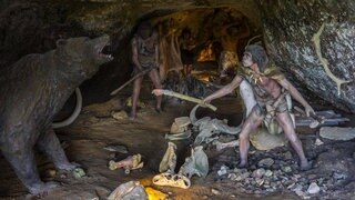 Darstellung von Höhlenmenschen im Kampf gegen einen Bären. Entwicklung der Spezies Mensch.