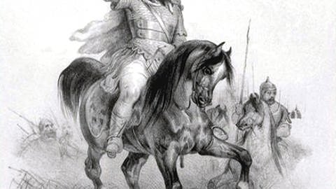Schwarzweiß-Stich: Attila in Rüstung und mit Krone auf dem Kopf auf seinem Pferd. Unter dem Pferd liegt ein geschlagener Gegner. (Foto: AKG)