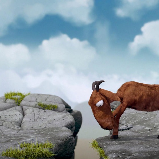 Kleine Ziege versucht große Ziege zum Springen zu bringen.