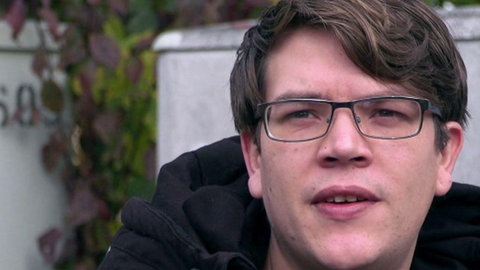 Portrait eines jungen Mannes.