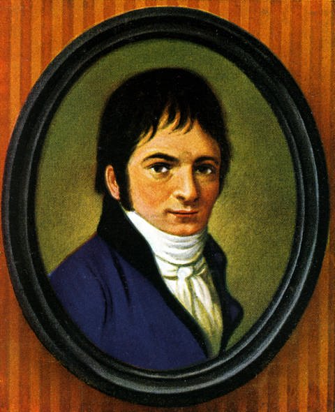 Gemälde: Beethoven mit kurzen dunklen Haaren und in blauer Jacke.