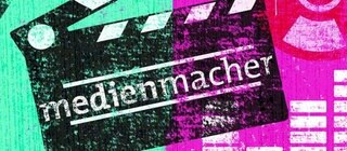 Zeichnung einer Filmklappe, auf der "medienmacher" steht.