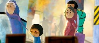 Bannerbild Flüchtlingsfamilie