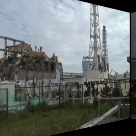 Blick durch Scheibe auf zerstörtes Atomkraftwerk. (Foto: SWR – Screenshot aus der Sendung)