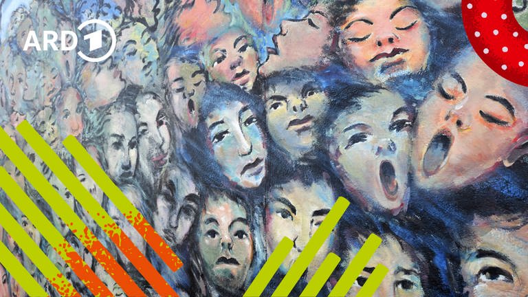 Malerei auf der East Side Galery mit Gesichtern.