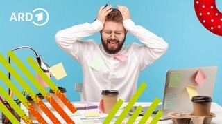 Ein Mann am Schreibtisch schlägt verzweifelt die Hände über dem Kopf zusammen.