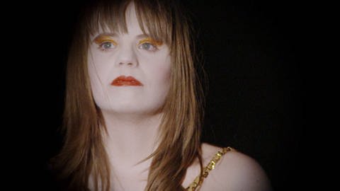 Porträt einer jungen Frau mit Down-Syndrom. (Foto: SWR – Screenshot aus der Sendung)