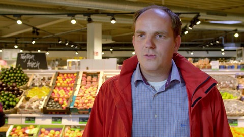 Tobias Bandel in Supermarkt.
