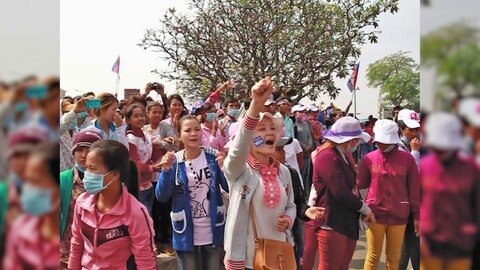 Demonstration von asiatischen Arbeiterinnen.