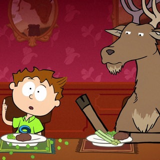 Der kleine Philosoph Knietzsche sitzt mit einem Hirsch an einem gedeckten Tisch und hebt die Hand.