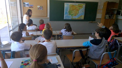 Kinder ein einer Schulklasse.