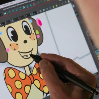 Am Tablet wird das Gesciht einer Comicfigur nachgezeichnet